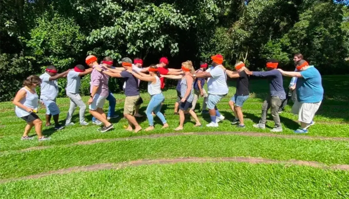 The Codeo team playing a team game outdoors